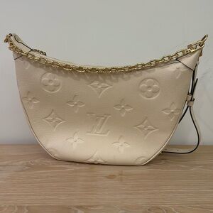 Like New - LV Loop Hobo in cream empreinte leather